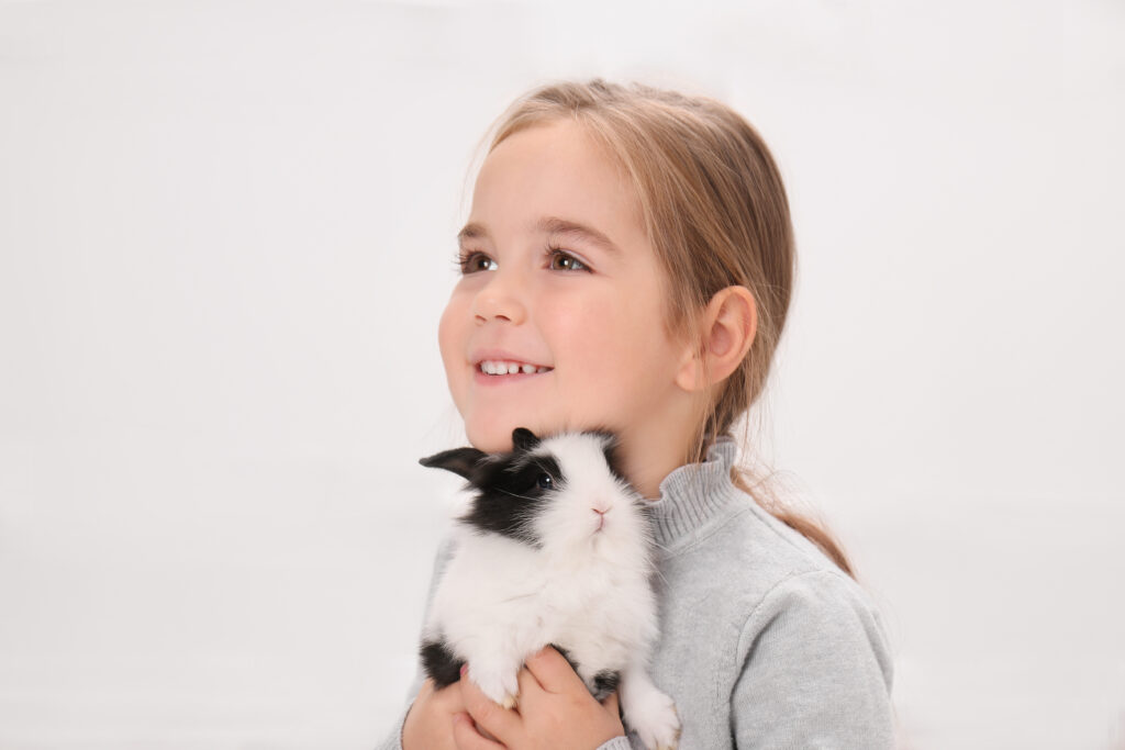 Girl Holding Bunny